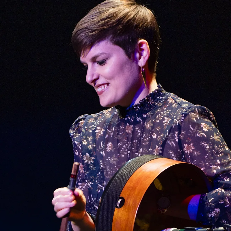 Anna Colliton playing her bodhrán